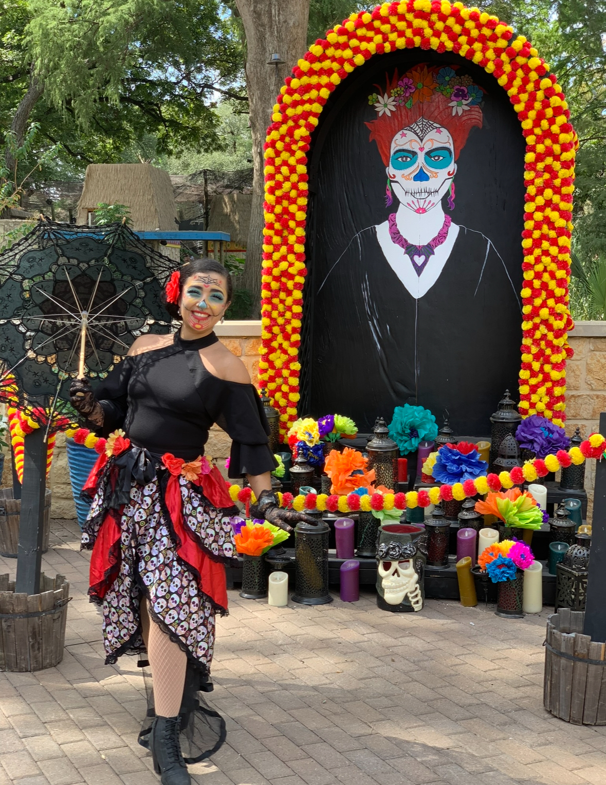 A woman in Dia de los muertos makeup